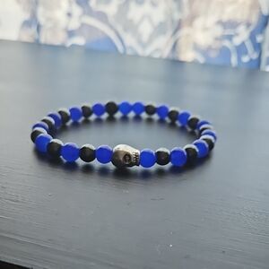 Black and Blue Beaded Bracelet with Skull Charm